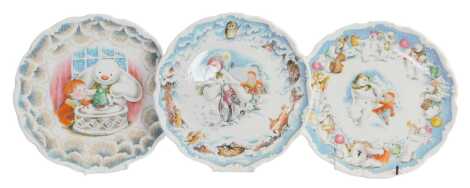 Three Royal Doulton Snowman Gift Collection collector's plates, comprising Dance of the Snowman, The Snowman's Motorbike Ride, and Snowman Christmas Cake, 21cm diameter. (3)