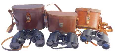 Three sets of binoculars, comprising Ray London Space Vu 8x30 binoculars, Hercules 8x30 field binoculars, and Ross London 9x35 Solar Ross binoculars, each in leather case. (3)