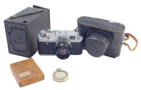 An Ensign box camera, a B Exposure meter, and a Bopknn Zorki 4 camera, with Jupiter lens.