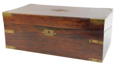 A Victorian mahogany utility box, with brass bound corners and key plate, with a fitted brown leatherette interior, 18cm high, 47cm wide, 26cm deep.