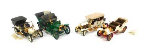 Four Franklin Mint precision diecast model cars, comprising Mercedes Simplex 1904, Rolls Royce 1905, Packard Victoria and Rolls Royce 1911. (4)