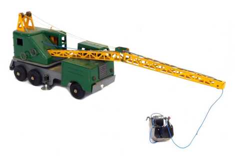 A Lumar Contractors tin plate crane, in yellow and green.