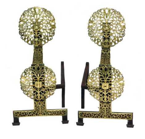 A  pair of 19thC brass and wrought iron andirons, in the 17thC style