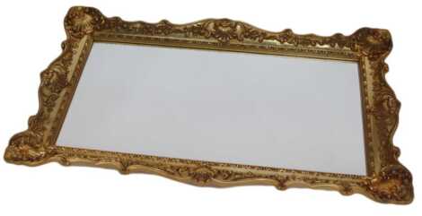 A 20thC wall mirror, in moulded plastic scrolling and floral decorated frame to simulate a gilt wood piece, 140cm x 86cm.