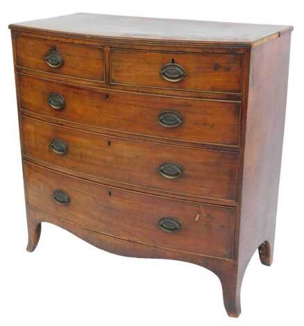 A George III mahogany bow front chest, of two short over three long graduated drawers, raised on out swept feet, 97cm high, 97cm wide, 51cm deep.