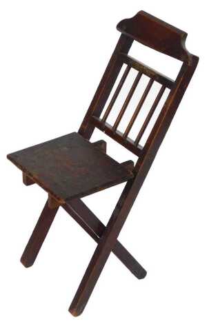 A 19thC oak folding child's or doll's chair, 68cm high.