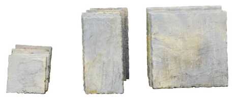 A group of grey garden slabs, in three sizes, 30cm x 30cm, 30cm x 60cm, and 60cm x 60cm.