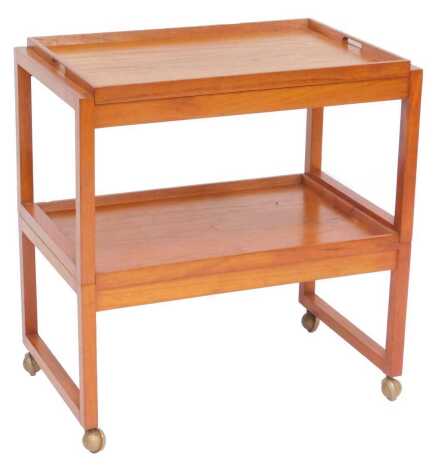 A mid century White and Newton Ltd teak tray top two tier trolley, on castors, 71cm high, 68.5cm wide, 43cm deep.