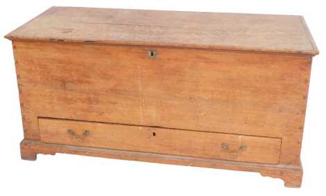 A 19thC oak mule chest, the hinged lid enclosing a vacant interior with drawer to base, on bracket feet, 60cm high, 125cm wide, 54cm deep.