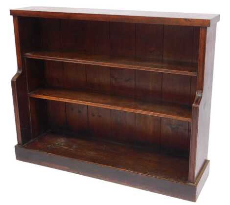 An oak waterfall bookcase, 91cm high, 112cm wide, 30cm deep.