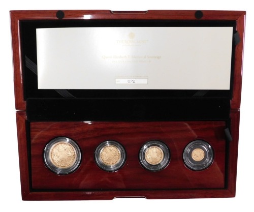 A Queen Elizabeth II memorial 2022 four gold coin proof set, comprising double sovereign, sovereign, half sovereign, and quarter sovereign, limited edition number 72/750, with box and packaging.