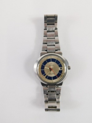 An Omega Dynamic automatic wristwatch, the oval silvered dial with blue rim and date aperture, on a stainless steel strap, the dial 4.5cm wide, with associated paperwork movement no. 29051131. - 2