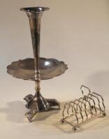 A silver plated toast rack and a plated single trumpet epergne.