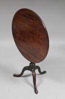 An early 19thC mahogany tilt top table