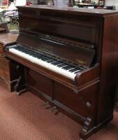 An early 20thC Challen & Son rosewood framed upright piano