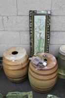 A pair salt glaze ale barrels and a tile picture of a flower