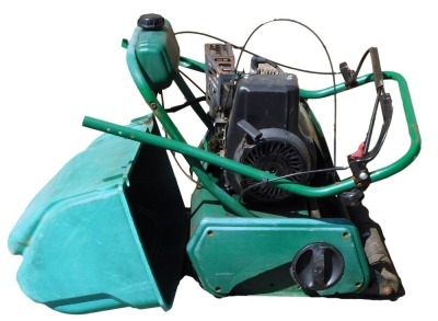 A Qualcast Classic Petrol 35S mower. Buyer Note: VAT is payable on the hammer price of this lot.