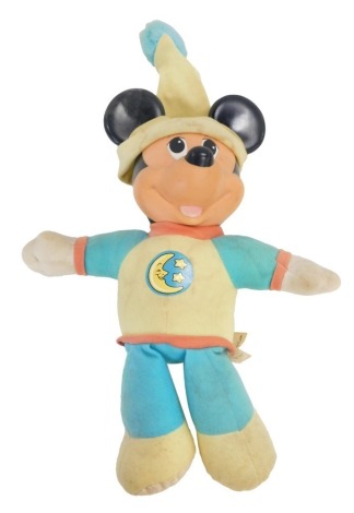 A Walt Disney Mickey Mouse toy in night wear.