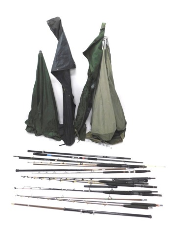 A large quantity of fishing equipment, to include a Tracker camp bed, a Max's Monster two piece split cane fishing rod, various rods. Buyer Note: VAT is payable on the hammer price of this lot.