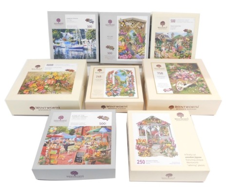 Eight Wentworth wooden jigsaw puzzles, to include B&B, Glenny's Garden Shop, Harbour Springs, Lakeside Arbour, Garden Flowers, Spring Flowers & Poole Pottery, A Day at the Farmer's Market, and Springtime Gazebo. (8)