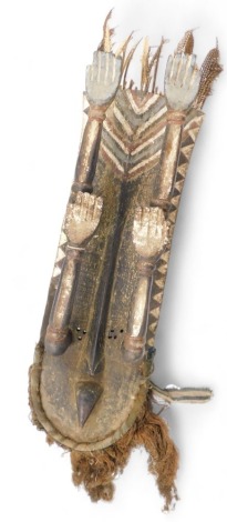 Tribal Art. Grebo/Kru/Krou tribe, large Shield mask 'Surrender' with two sets of arms up and Maou beak, collected from village near Pleebo, Liberia, 95cm high.