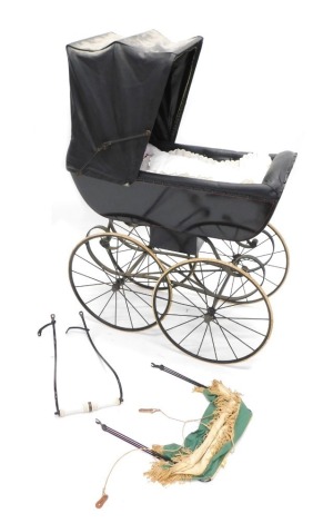 A coach built child's pram, with black metal sides, EPVC black hood, spoked wheels, with wrought iron suspension.