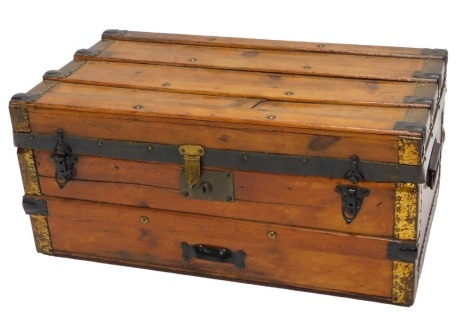 A late 19th/early 20thC slatted pine and metal cabin trunk, 68cm wide.