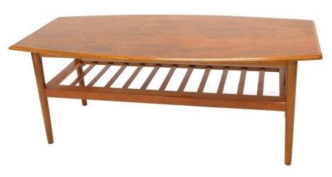 A G-Plan style teak coffee table, the rectangular top with shaped sides and a moulded edge, above a slatted under tier, on turned legs, 47cm high, 120cm wide.