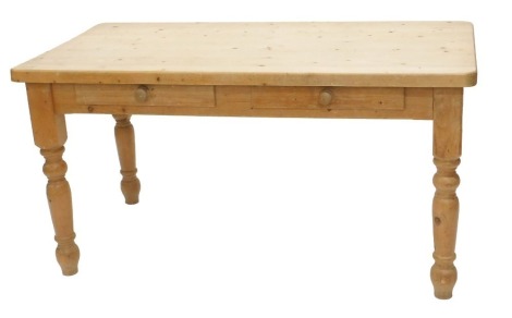 A Victorian style pine dairy table, the rectangular top above two frieze drawers, on part turned legs, 79cm high, 150cm wide, 80cm deep.