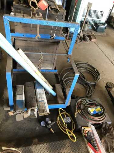 An Oxy Acetylene welders trolley, together with various cables, welding/cutting sets.