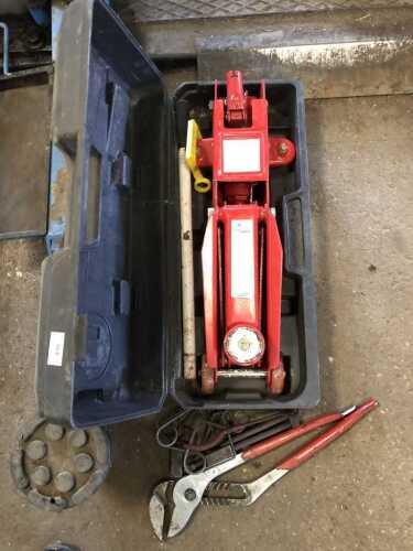 A small trolley jack, adjustable wrench, etc.