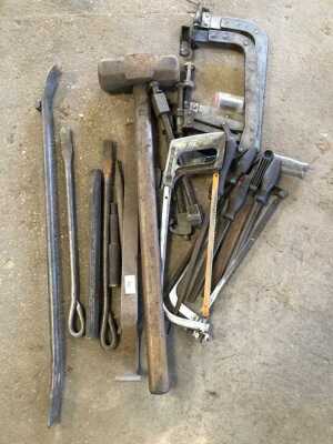 Lever bars, sledge hammer, G clamps, and other tools.