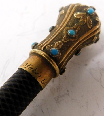 A Victorian riding crop, by Slark of London, with turquoise set brass knop, 67.5cm long. - 2