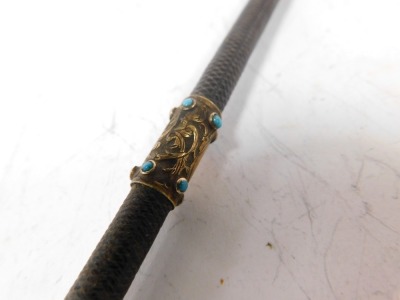 A Victorian riding crop, by Slark of London, with turquoise set brass knop, 67.5cm long. - 3