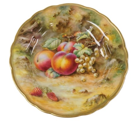A Royal Worcester porcelain plate, circa 1924, painted by T Lockyer with peaches, gooseberries and loganberries, signed, painted and printed marks, 23cm wide.