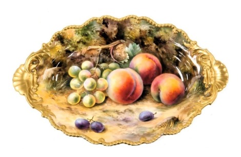 A Royal Worcester porcelain dish, circa 1924, painted by T Lockyer, with peaches and grapes, printed marks, 31.5cm wide.