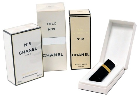 A bottle of Chanel No 5 eau de parfum vapourising spray, 100ml, Chanel No 19 eau de toilette, refillable spray, a Chanel No 19 talc, and a Chanel No 5 handbag eau de parfum, all boxed. (4)