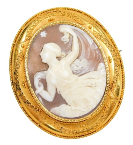A late 19thC oval cameo brooch, carved with Psyche, in a yellow metal mount, 10.2g.