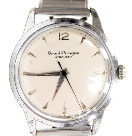 A Girard-Perregaux Gyromatic gentleman's plated metal cased wristwatch, circular silvered dial, centre seconds, on an elasticated bracelet strap.