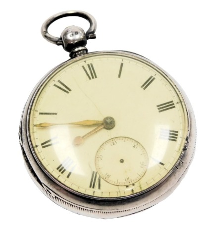 A Victorian gentleman's silver cased pocket watch, open face, key wind, circular enamel dial bearing Roman numerals, subsidiary seconds dial, fusee movement, number 6756, the case with engraved shield and garter, London 1877.;