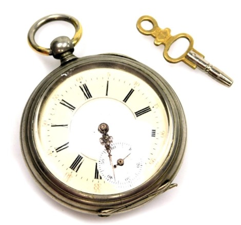 A 19thC silver plated pocket watch, with a cream and white Roman numeric dial, with gold hands and seconds dial, in a silver plated case, with carved crest, and later swing hook, key wind.