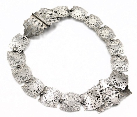 A silver plated nurse's belt, with foliate scroll decoration, stamped EPNS, 65cm long.
