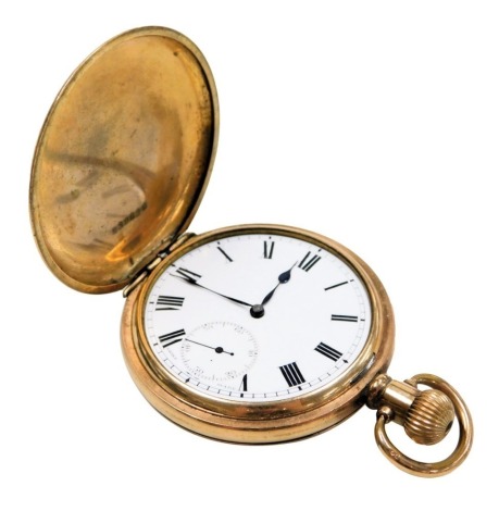 A gentleman's gold plated hunter pocket watch, keyless wind, circular enamel dial bearing Roman numerals, subsidiary seconds dial, Swiss Visible movement, the case of plain form.