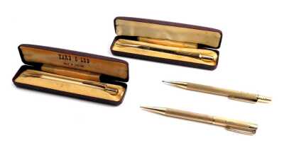 Four Yard O' Lead rolled gold pencils, two with engine turned decoration, one plain, and one initialled E C.