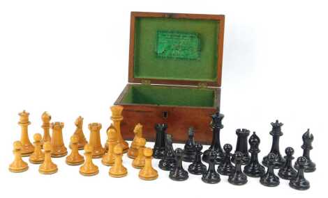 A Jaques and Son London Staunton pattern boxwood and ebony chess set, enclosed in a mahogany box, 18cm wide. (some pieces AF)