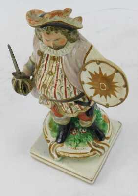 An early 19thC Staffordshire figure, modelled as James Quin in the Role of Sir John Falstaff, 22.5cm high. (AF) - 2