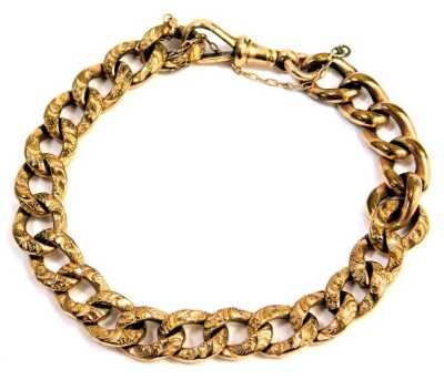 A Victorian hammered link gold plated watch chain bracelet, with single clip and safety chain, 22cm long.