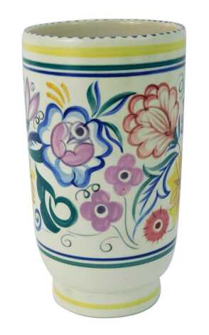 A 20thC Poole pottery vase, of cylindrical form, traditionally painted with flowers, printed mark, 24cm high.