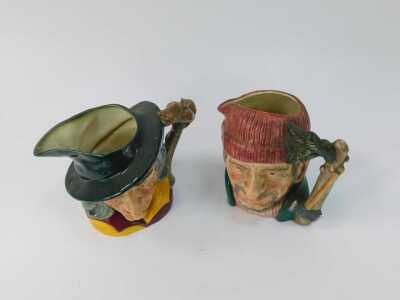 Two Royal Doulton large character jugs, comprising The Pied Piper 6403, and Lumberjack D6610, 20cm high. - 2