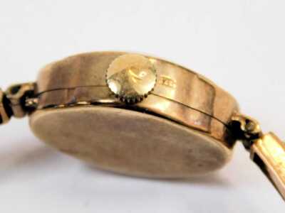 A Rodonia 9ct gold lady's wristwatch, circular silvered dial, on a 9ct gold bracelet, 10.6g all in. - 3